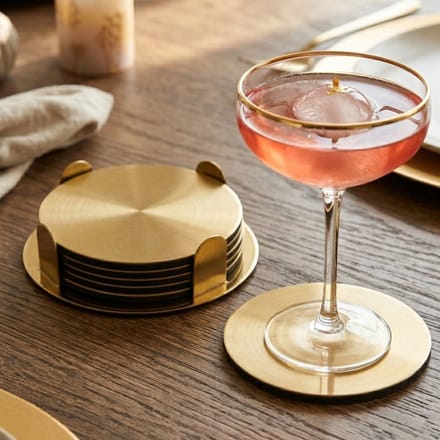 Bellatio Design Onderzetters - 24x - goud - RVS - 8,5 cm - met houder - schuimlaag - glasonderleggers