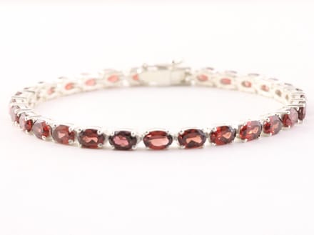 Zilveren tennisarmband met granaat