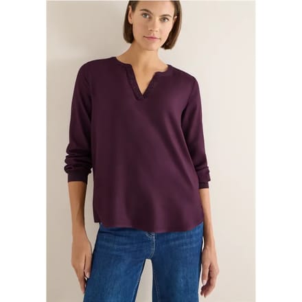 Blouse met glitterdetails