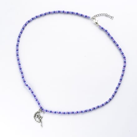 Ketting in paarstinten met elfje hanger