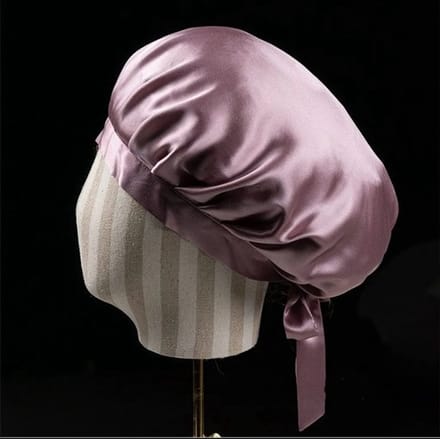 Roze zijden slaapmuts