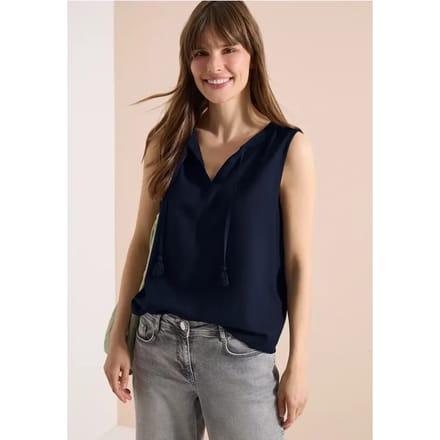 Blousetop met gespleten hals en linten