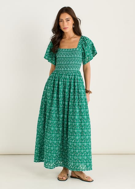 Groene midi-jurk met bloemenbroderie en plooien