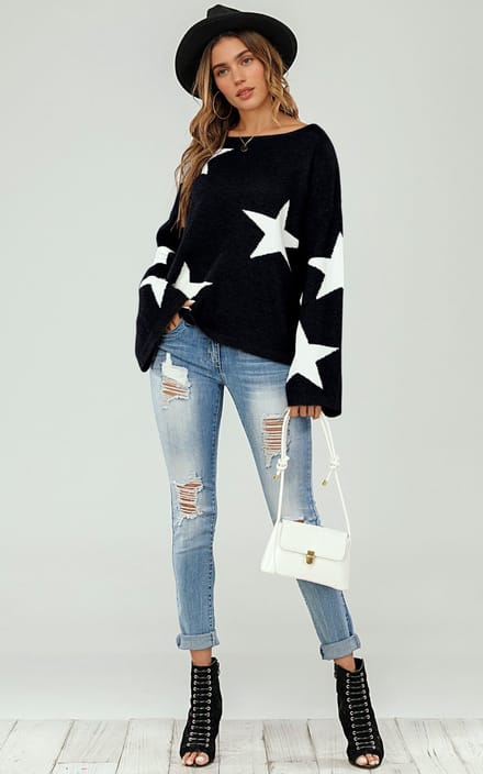 Oversized zwarte trui met wijde mouwen en witte ster