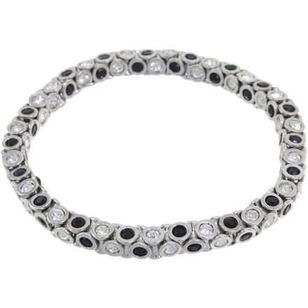Behave - elastische armband met zwarte steentjes - avondstijl