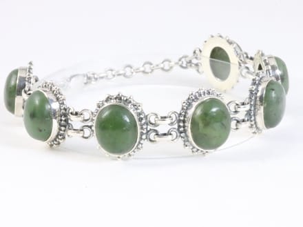 Zware bewerkte zilveren armband met jade