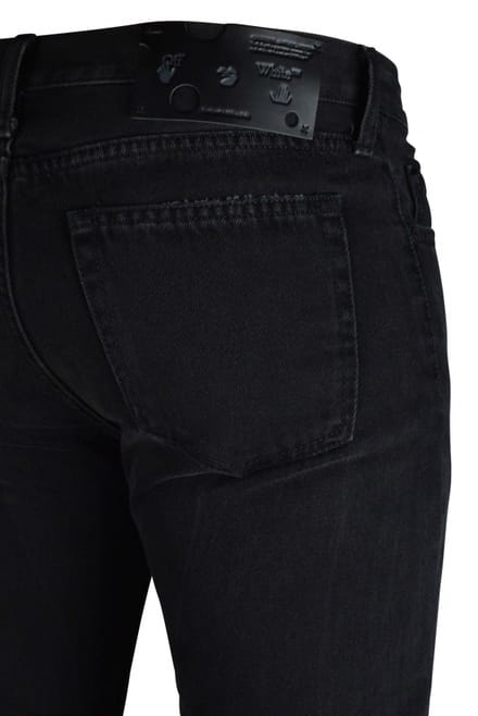 Gebroken witte jeans zwart