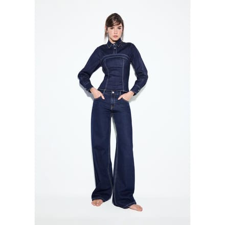 Stradivarius D91 Low-rise wide-leg jeans  OVERGEVERFDE DENIM WASSING 38