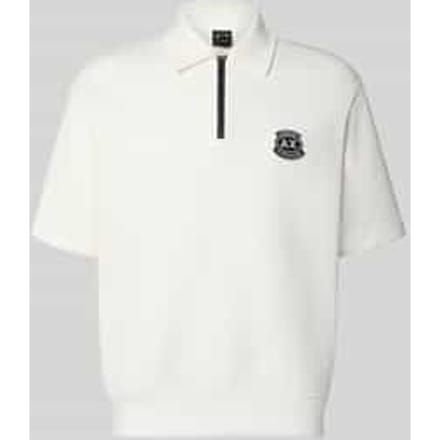loose fit poloshirt met labelstitching