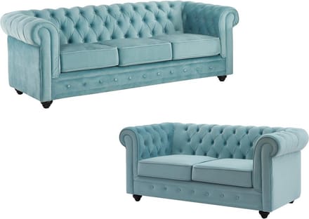 Vente-unique Drie- en tweezitsbank van pastelblauw velours CHESTERFIELD