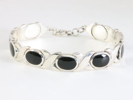 Zware hoogglans zilveren armband met onyx