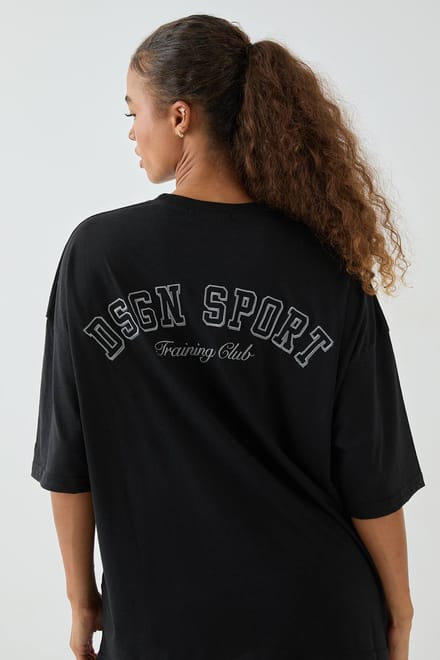 Dames DSGN Studio Sport Training Club Oversized T-Shirt | Zwart | Maat: Large
