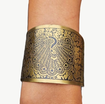 Klemarmband; armband met pauw in koper