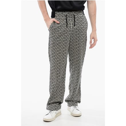 Dubbele jersey joggingbroek met monogrammotief in zwart-wit