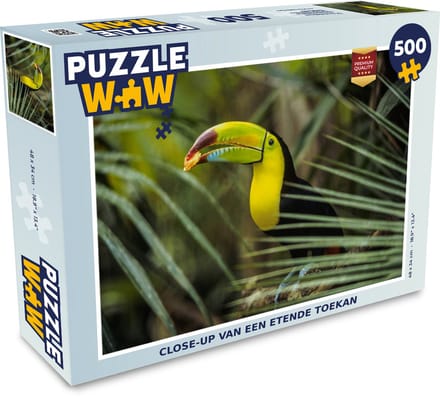 Puzzel Close-up van een etende toekan - Legpuzzel - Puzzel 500 stukjes
