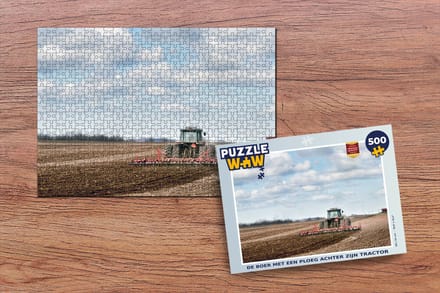 Puzzel De boer met een ploeg achter zijn tractor - Legpuzzel - Puzzel 500 stukjes