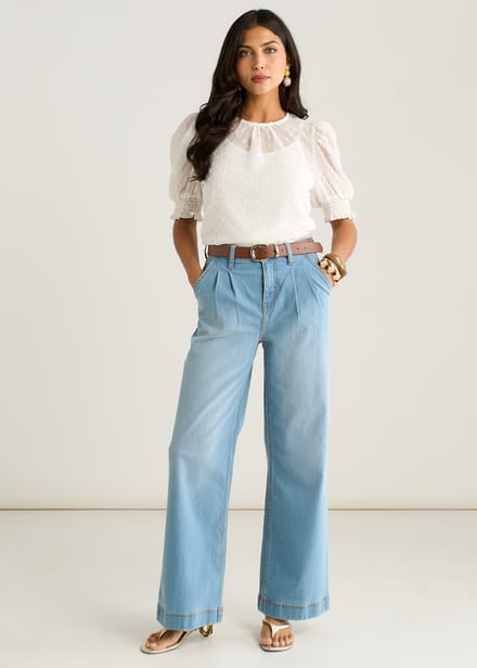 Lichtblauwe jeans met plooien en wijde pijpen