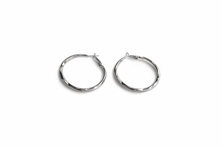 Gedraaide oorringen | dun | zilver gekleurd