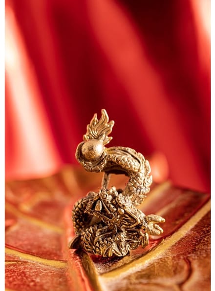Miniatuur dansende draak messing