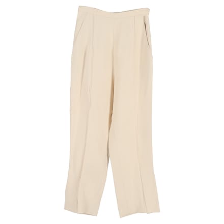 Khaite broek met wijde pijpen in crèmekleurige viscose