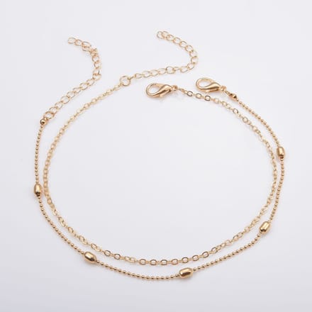 2 Enkelbandjes met ovaaltjes | goud gekleurd