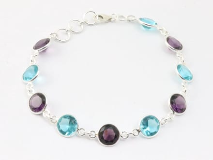 Zilveren armband met amethist en blauwe topaas