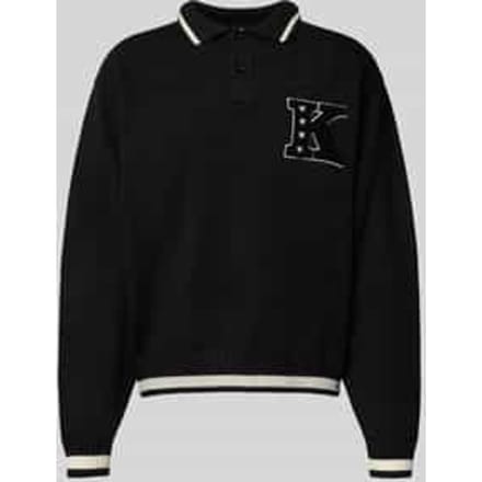 Gebreide pullover met polokraag en stitching