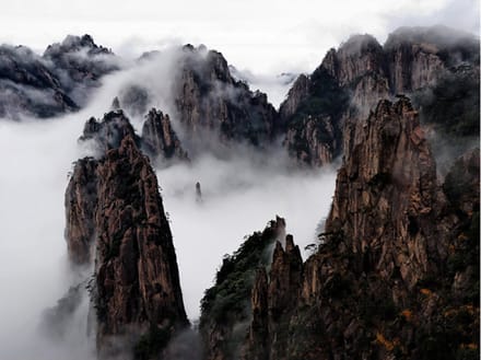 Fotobehang - Zee van wolken in Huangshan Mountain, China.