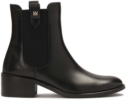 Slip-on black Chelsea boots with elastics and loops