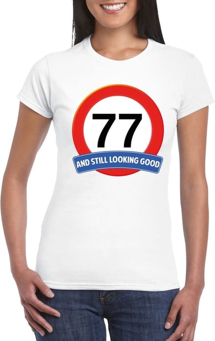 Verjaardag cadeau shirt - 77 jaar and still looking good t-shirt - wit - dames S