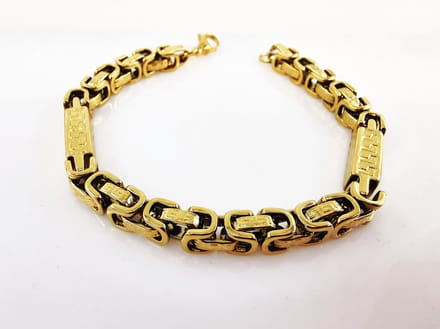 RVS - Heren - Koningsschakel - goudkleurig - design - Armband L 24 cm - Br 6 mm.