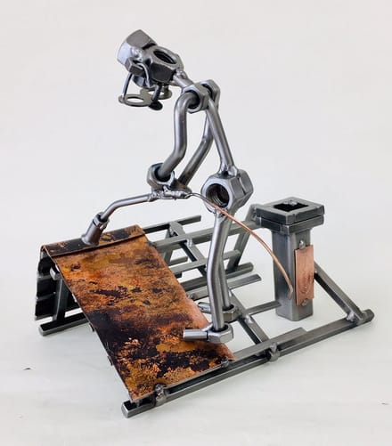 Hinz & Kunst smeedwerkfiguur beroepen "Dakdekker"