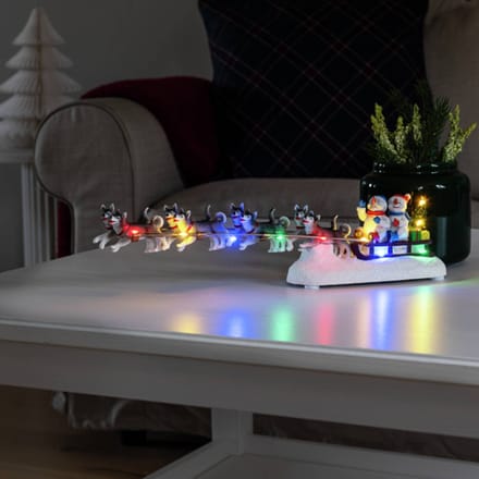 Konstsmide Kerstman in slee beeldje - met verlichting - 37,5 x 8,5 x 6,5 cm - kerstdorp figuur - kerstbeeldje