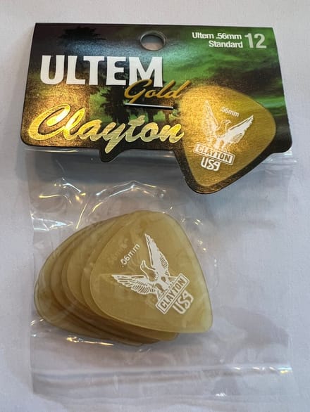 Clayton - Ultem Gold - standaard plectrum - 0.56 mm - 12-pack