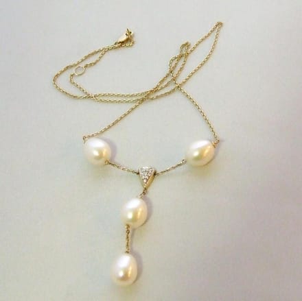 Gouden collier met parels