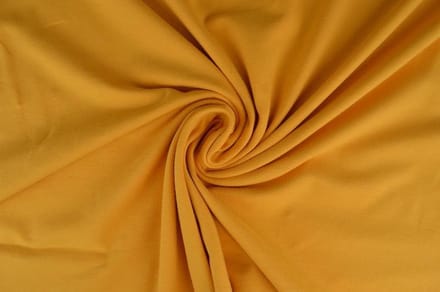 Katoen tricot stof - Okergeel - 10 meter
