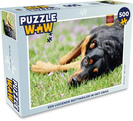 Puzzel Een liggende Rottweiler in het gras - Legpuzzel - Puzzel 500 stukjes