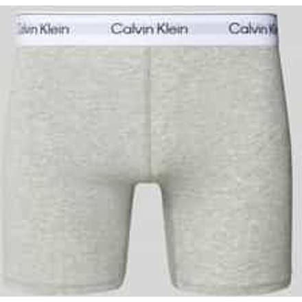 Broek met label in band