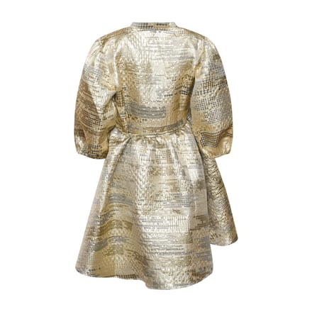 Jannie Aya-jurk in goud