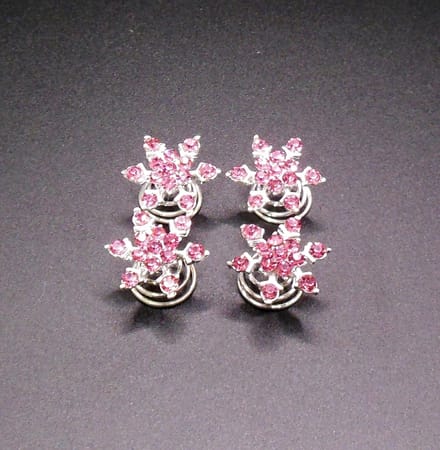 Curlies donkerroze bloem 6 blad punt met strass