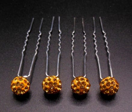 Haarpinnen strassbal goud set van 4 stuks.