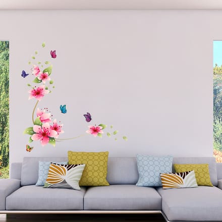 Decoratieve muurstickers met roze bloemen en vlinders