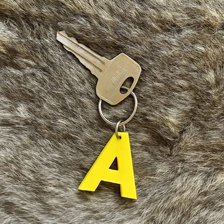 3D geprinte sleutelhanger - Letter U - Geel