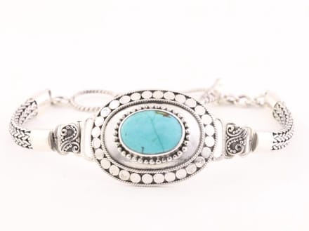 Traditionele bewerkte zilveren armband met turkoois