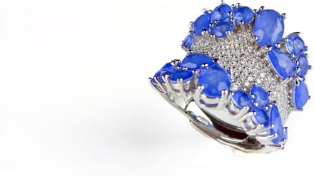 Brede zilveren ring blauwe stenen en cubic zirconia