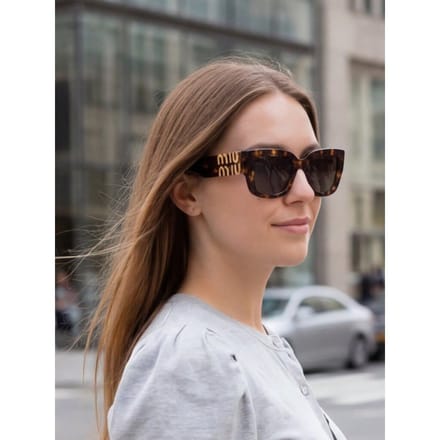 Lunettes de soleil pour femme Miu Miu SMUB05 marron