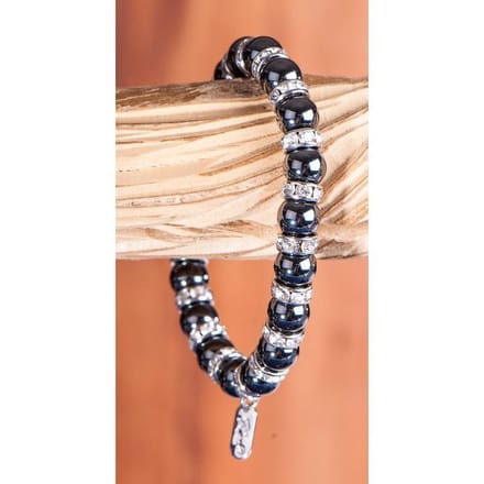 Magneet armband met witte kristal stenen