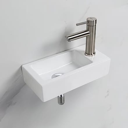 Compacte wandwastafel in keramiek - ruimtebesparend en eenvoudig te reinigen