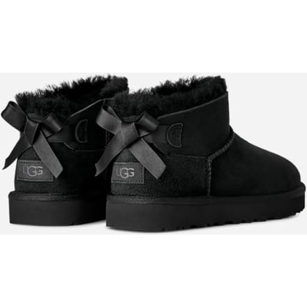 UGG® Ultra Mini Bailey Bow Boot in Black, Size 9, Polyester/Leather