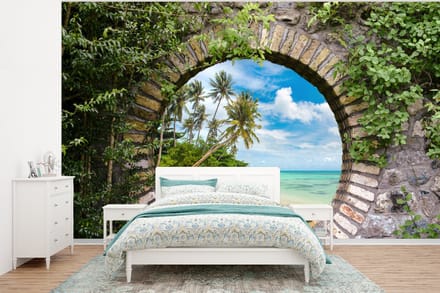 Behang - Fotobehang Strand - Palmboom - Doorkijk - Kano - Breedte 295 cm x hoogte 220 cm